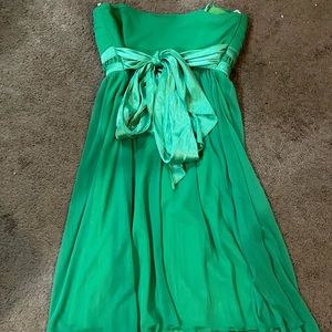 Beautiful green dress perfect for a cocktail party or even a formal dance.